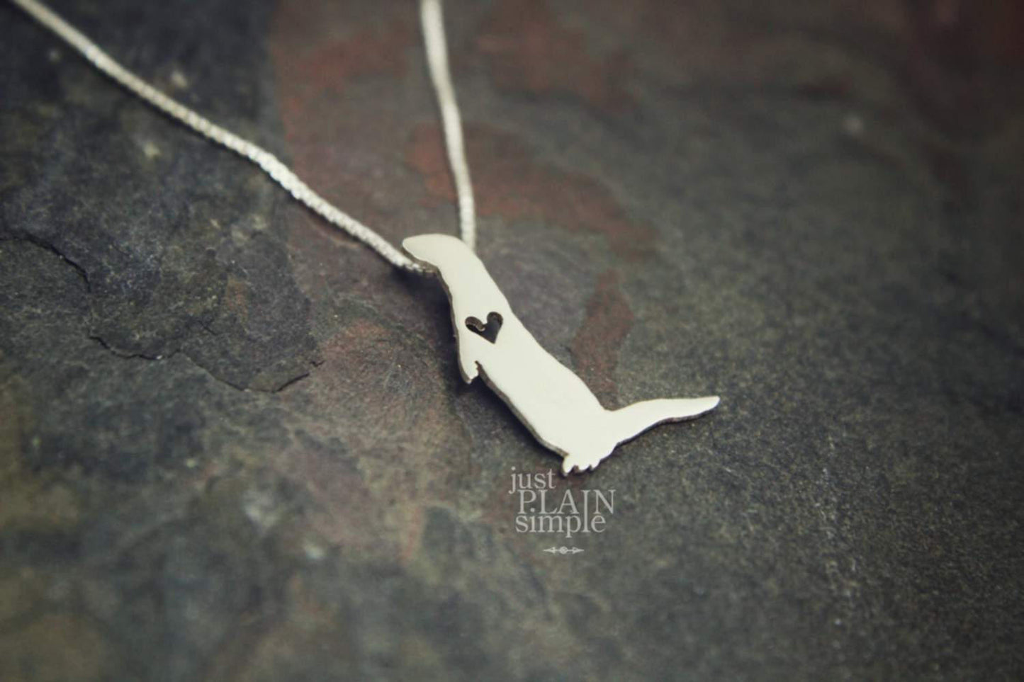 Tiny River Otter necklace, sterling silver pendant