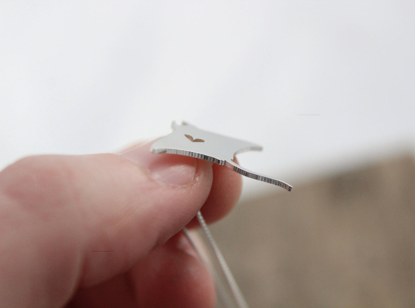 Tiny Manta Ray necklace, sterling silver pendant