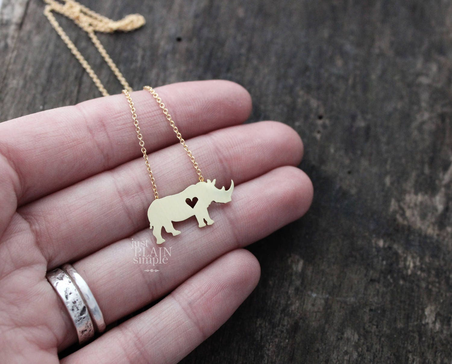 Tiny Rhinoceros necklace, Brass pendant