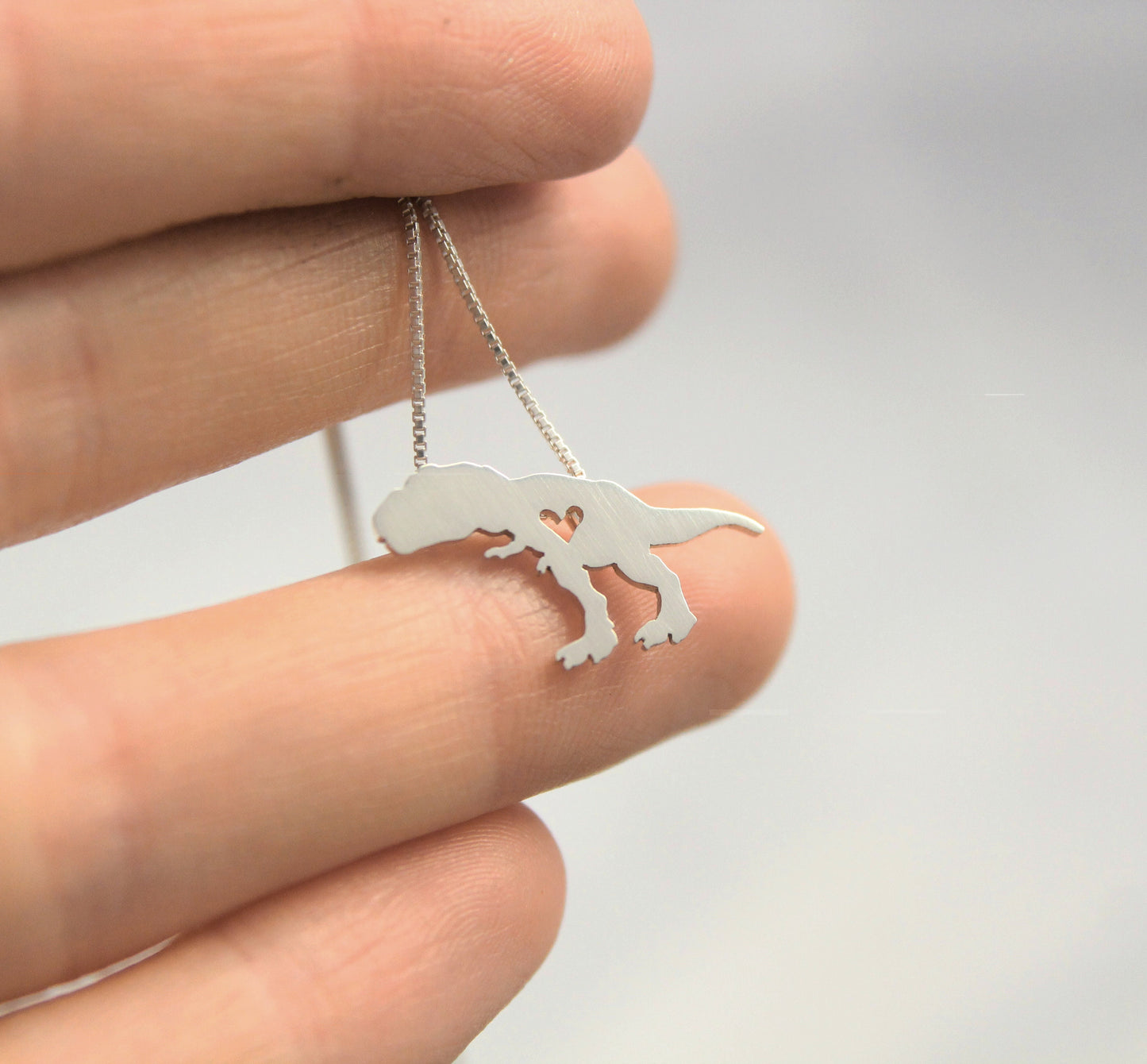 Tiny T-Rex necklace, sterling silver Dinosaur pendant