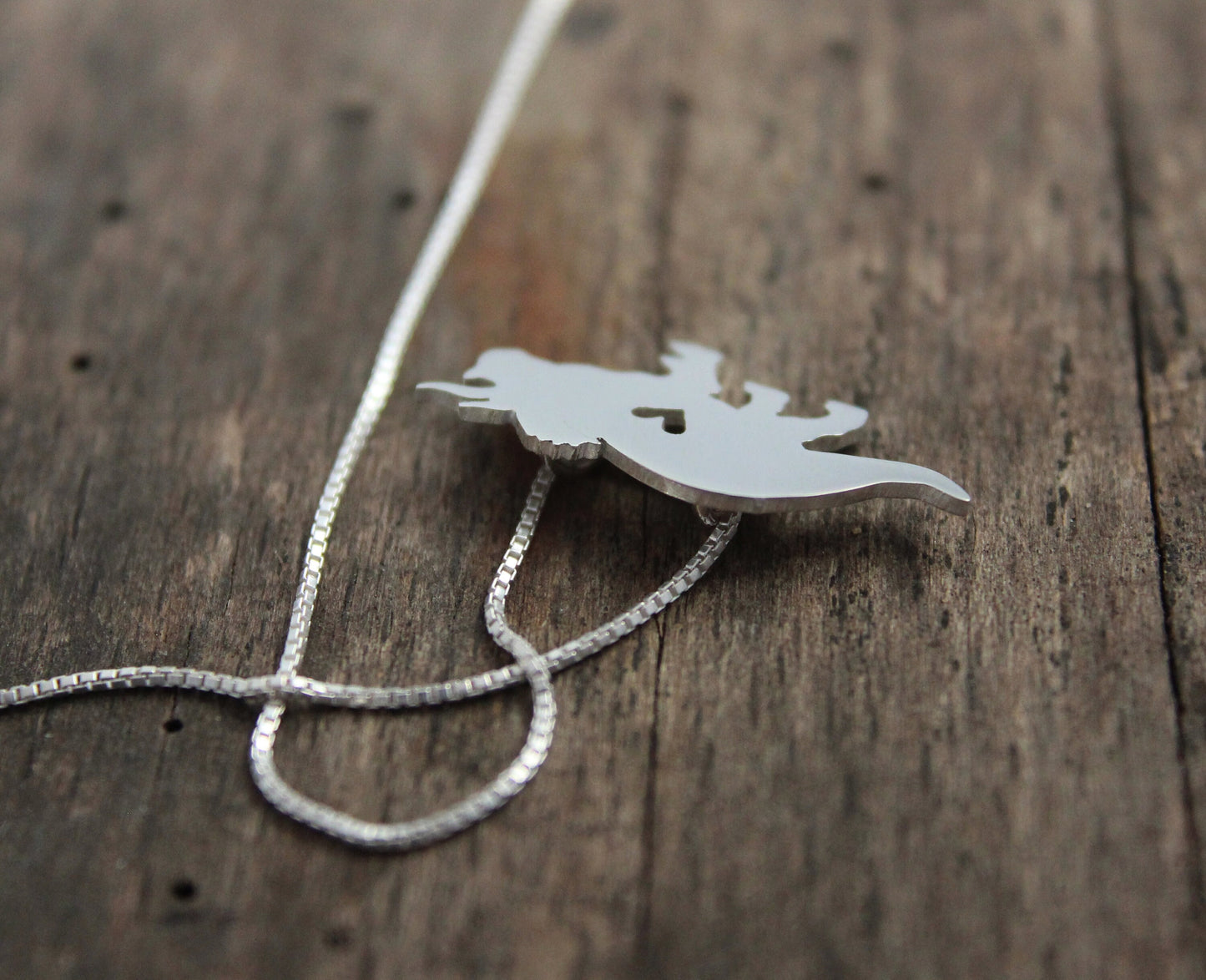 Tiny Triceratops necklace, sterling silver dinosaur pendant
