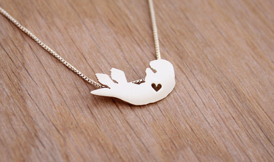 Tiny Sea Otter necklace, sterling silver pendant