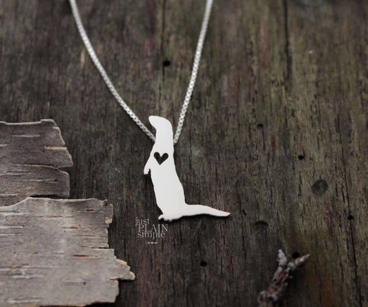 Tiny River Otter necklace, sterling silver pendant