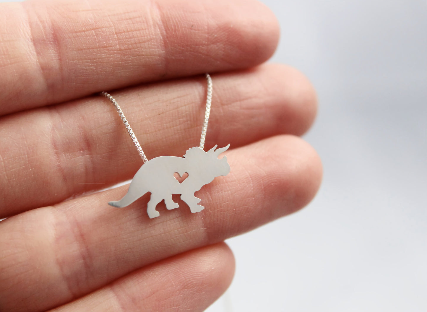 Tiny Triceratops necklace, sterling silver dinosaur pendant