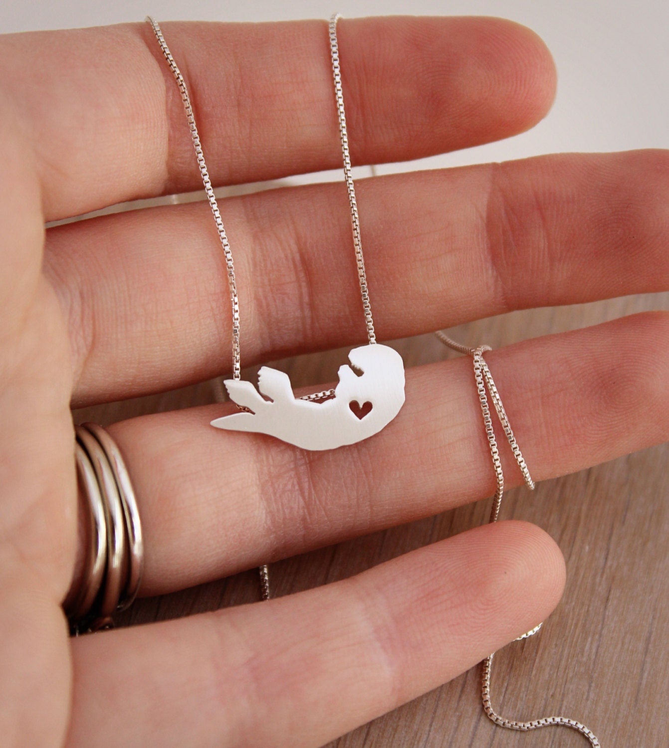 Tiny Sea Otter necklace, sterling silver pendant