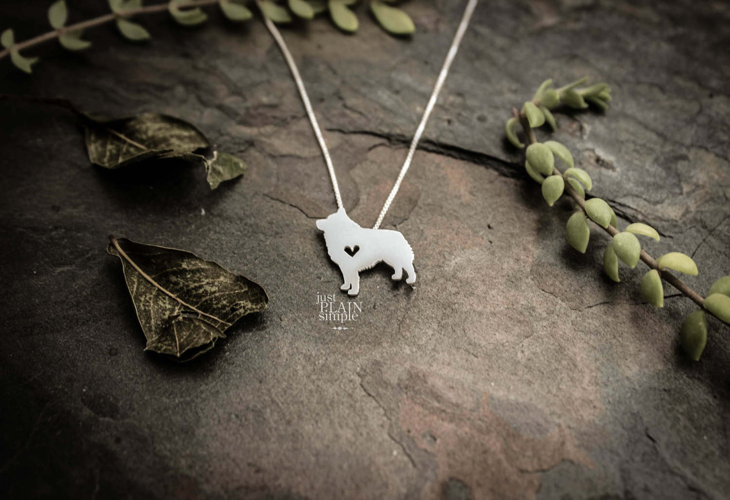 Tiny Schipperke necklace, sterling silver pendant