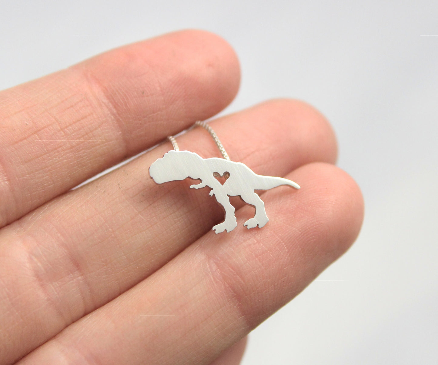 Tiny T-Rex necklace, sterling silver Dinosaur pendant