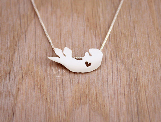 Tiny Sea Otter necklace, sterling silver pendant