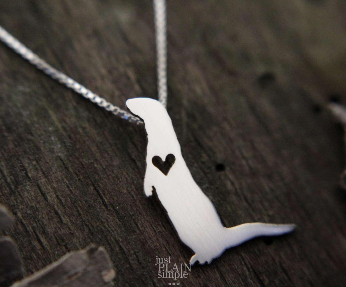 Tiny River Otter necklace, sterling silver pendant