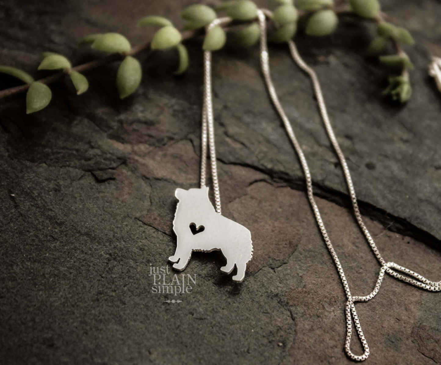 Tiny Schipperke necklace, sterling silver pendant