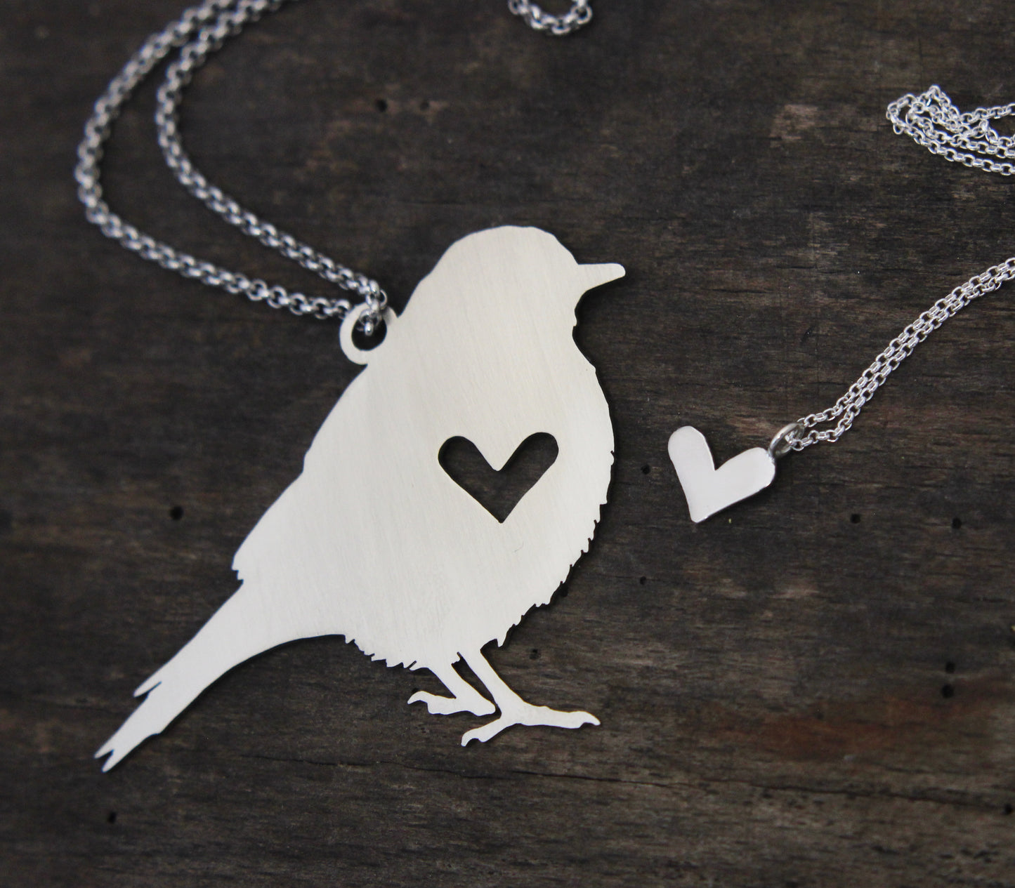 Song bird rear view mirror puzzle charm, and sterling silver heart necklace