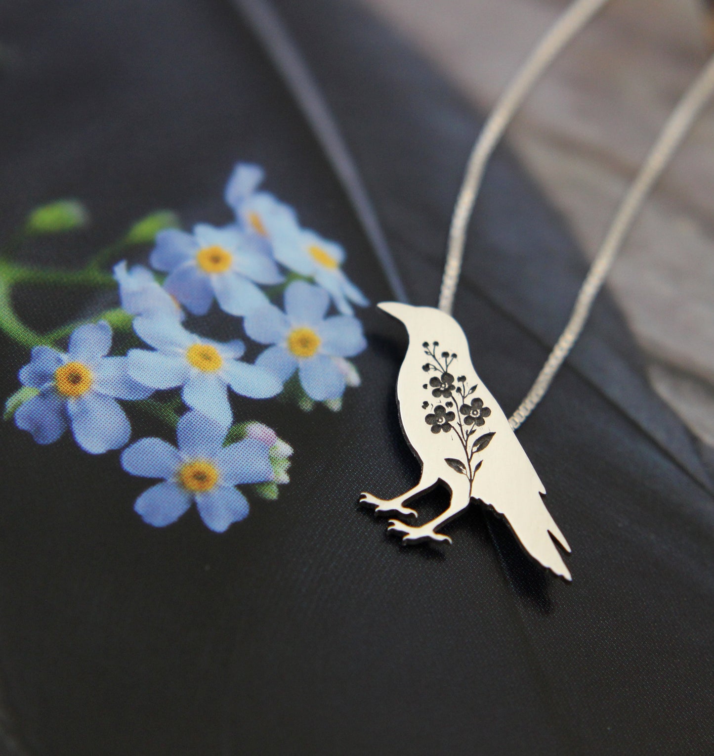 Crow necklace: Sterling silver Forget-me-not Crow pendant