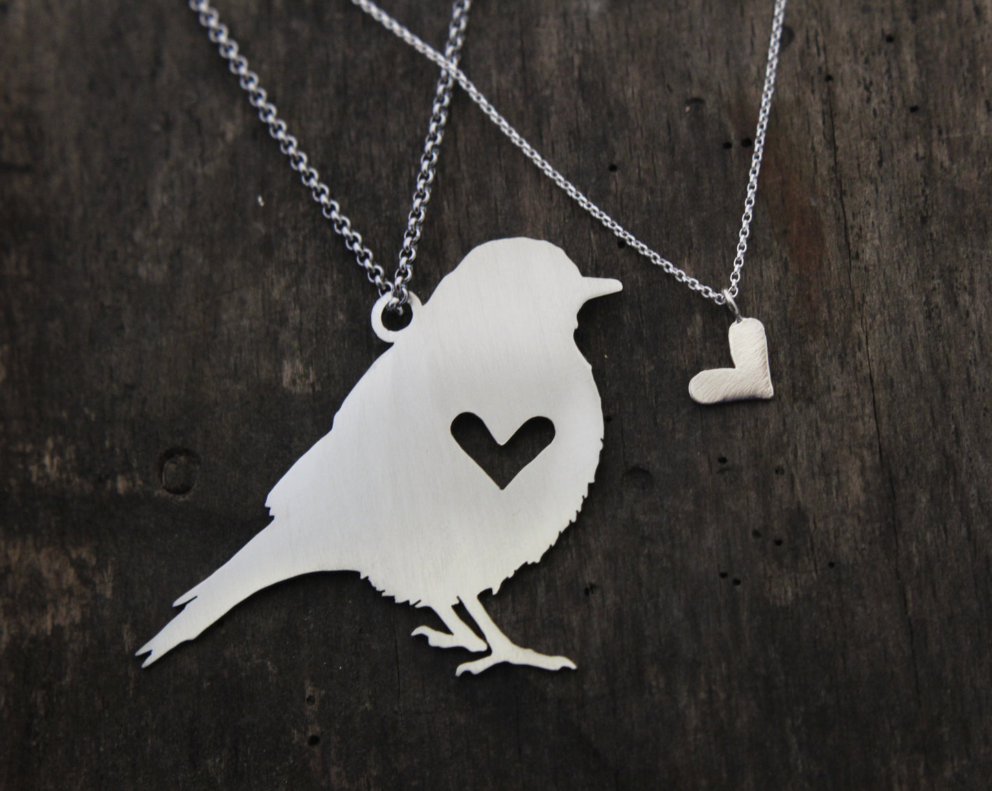 Song bird rear view mirror puzzle charm, and sterling silver heart necklace