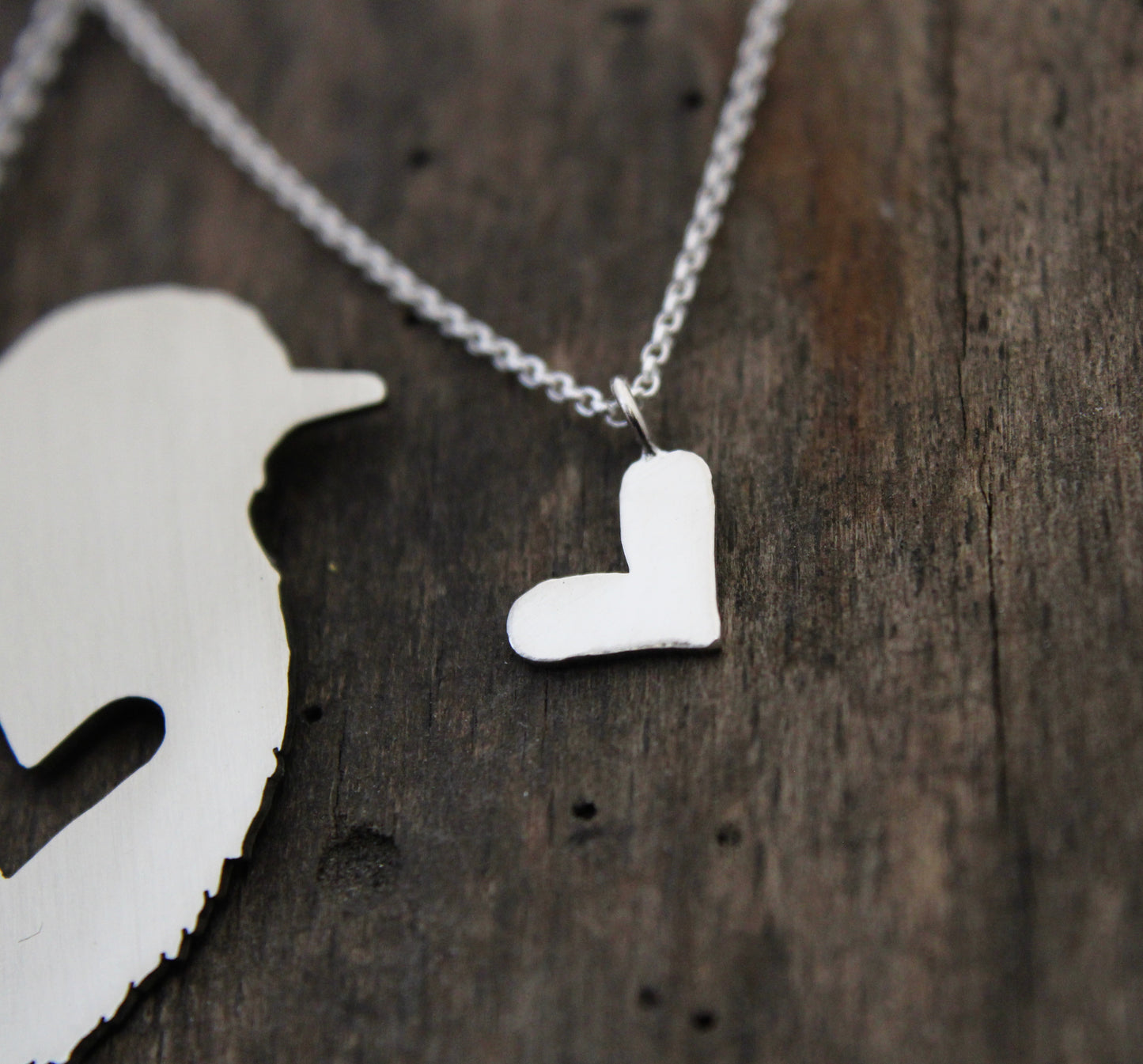 Song bird rear view mirror puzzle charm, and sterling silver heart necklace