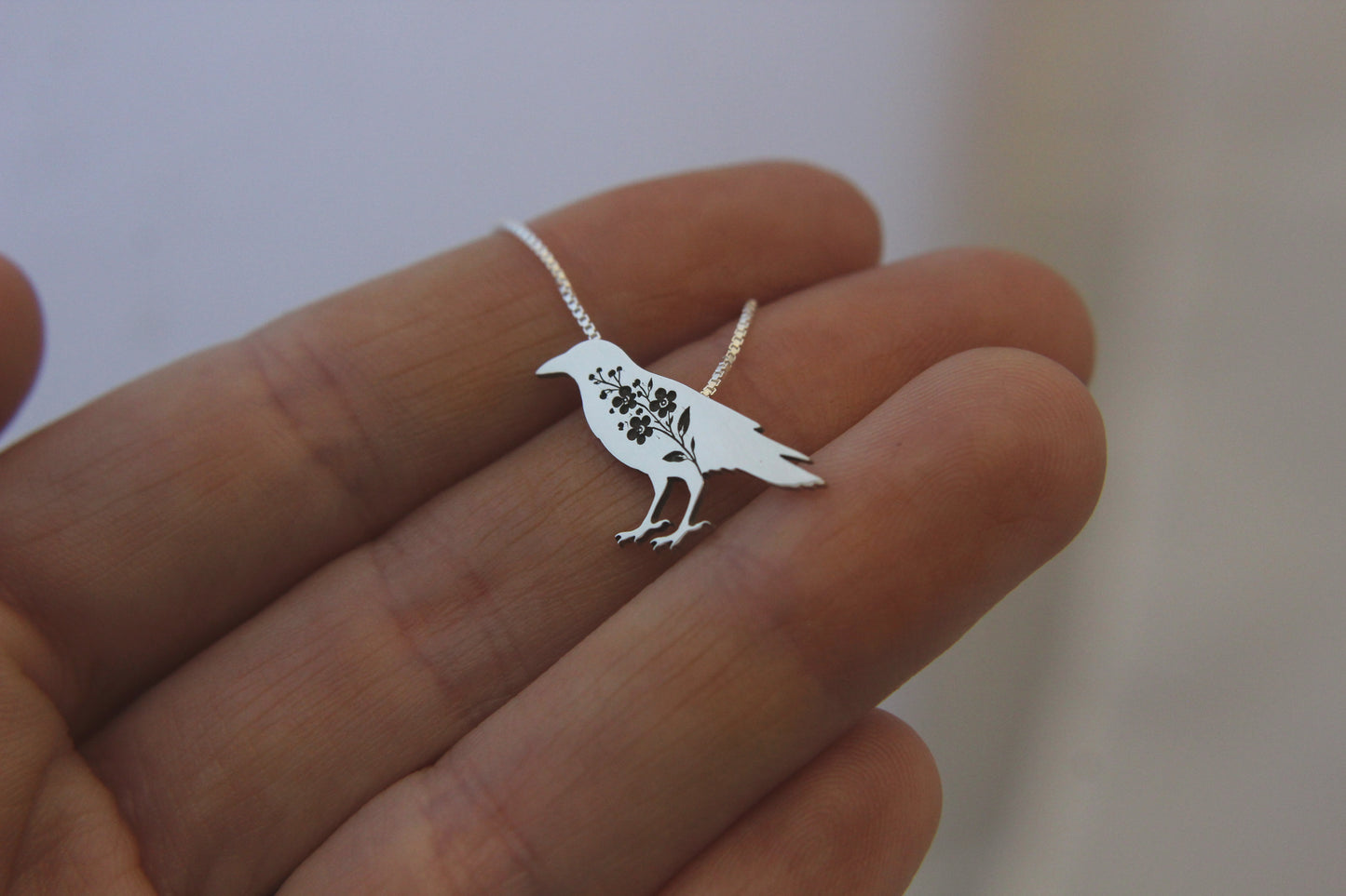 Crow necklace: Sterling silver Forget-me-not Crow pendant