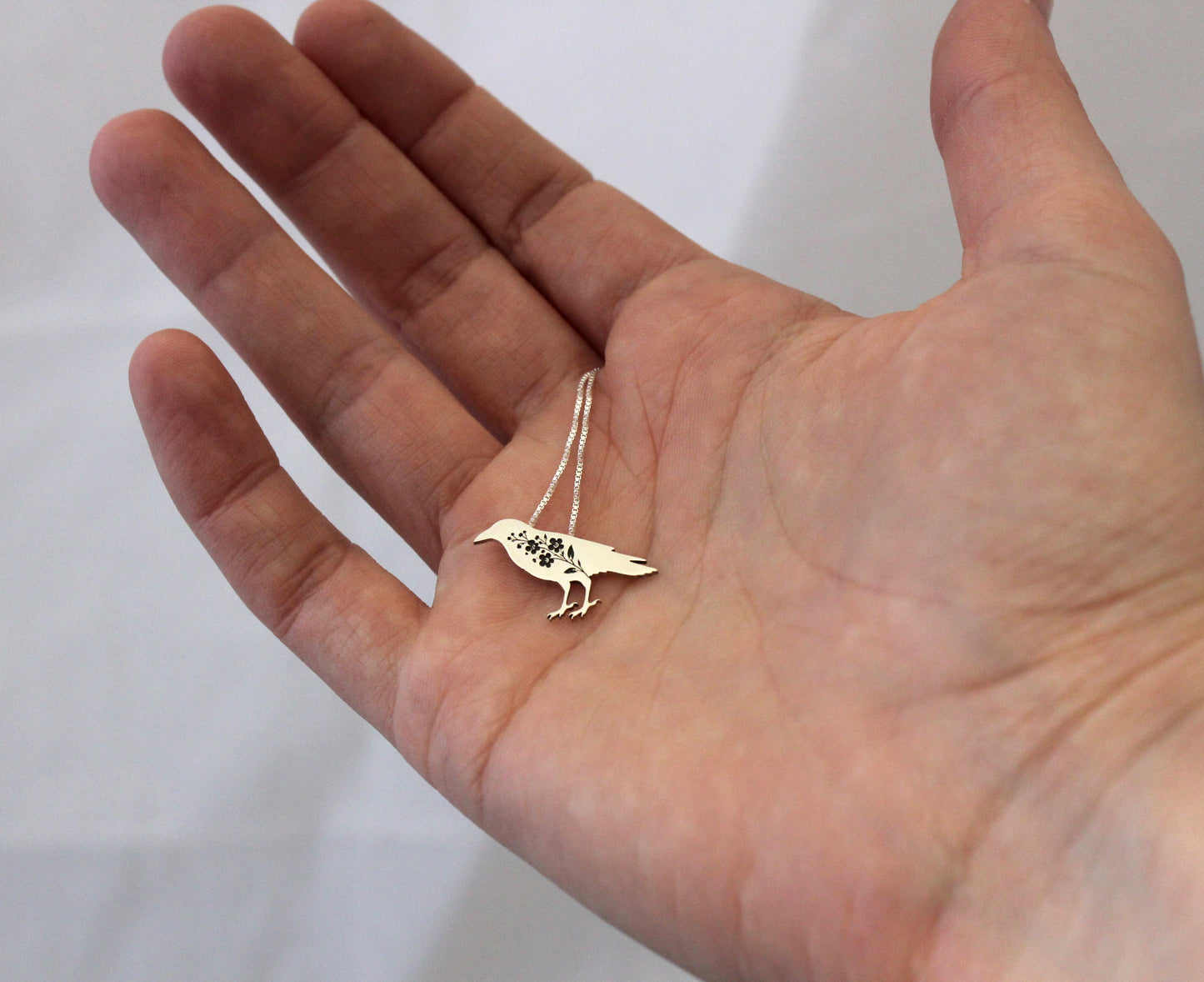 Crow necklace: Sterling silver Forget-me-not Crow pendant